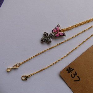 Butterfly's and the gothic silver cross handcrafted with gold tone chain 18 inch